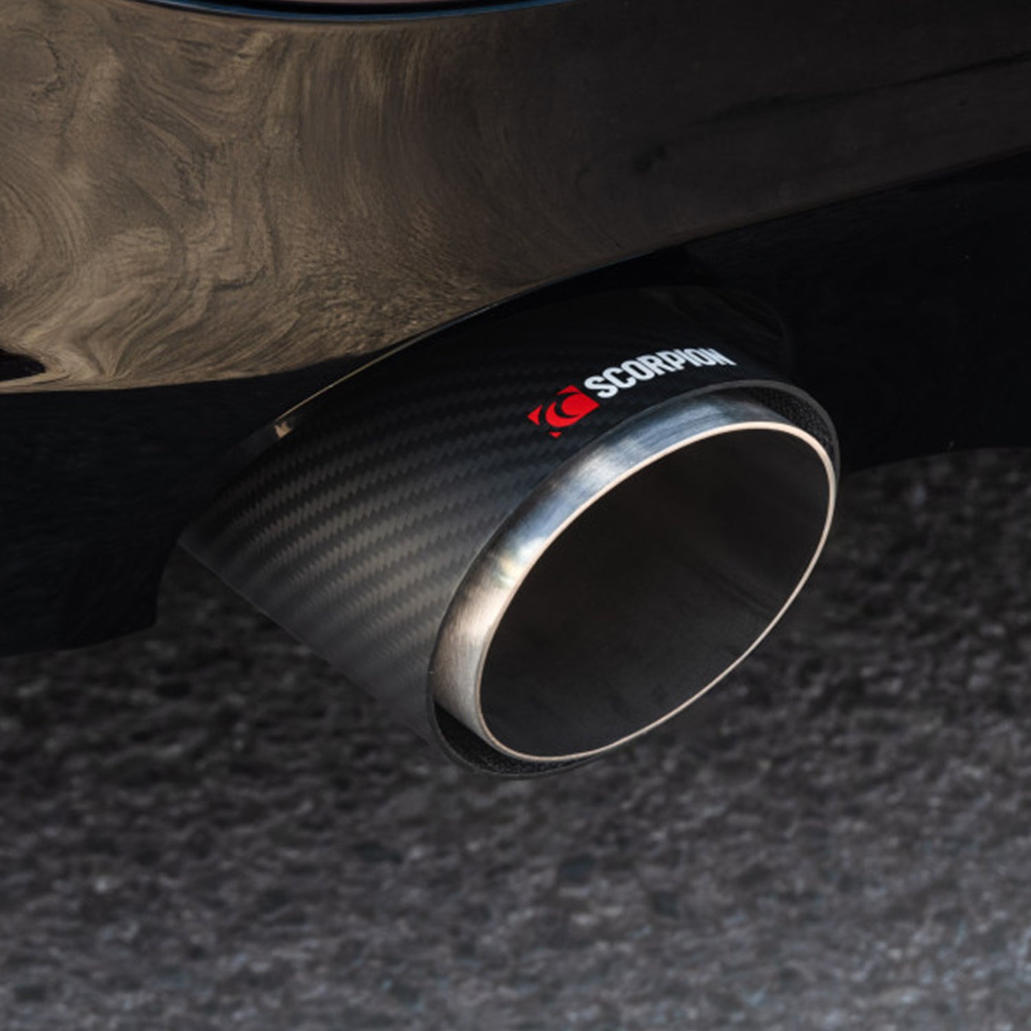 Close-up of BMW G42 230i Scorpion carbon fibre exhaust tip