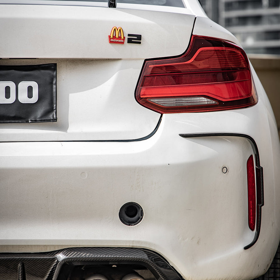 SooQoo BMW M2 F87 Rear Bumper Inserts In Gloss Carbon Fibre