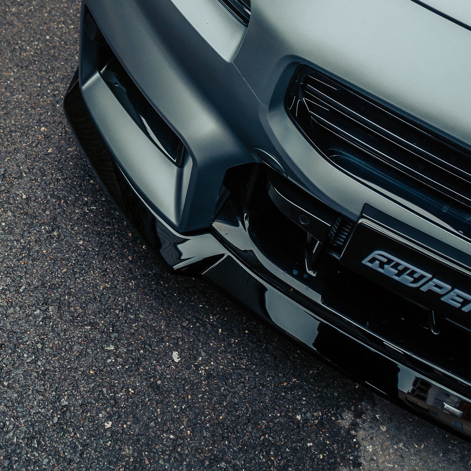 ZAERO Design BMW G87 M2 EVO-S Gloss Black Front Splitter On Grey Car