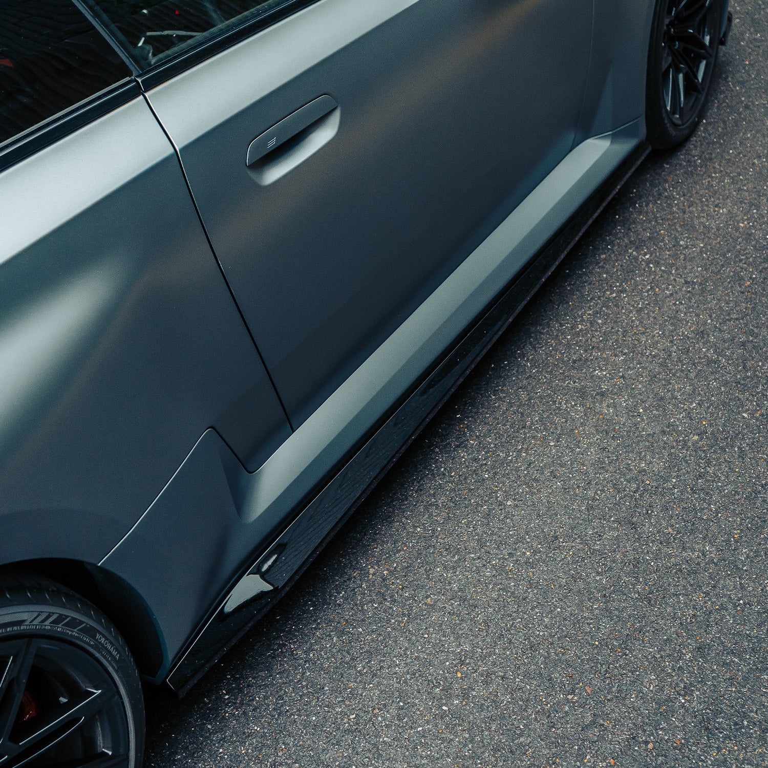 ZAERO Design BMW G87 M2 EVO-S Gloss Black Side Skirts Fitted On Grey Car