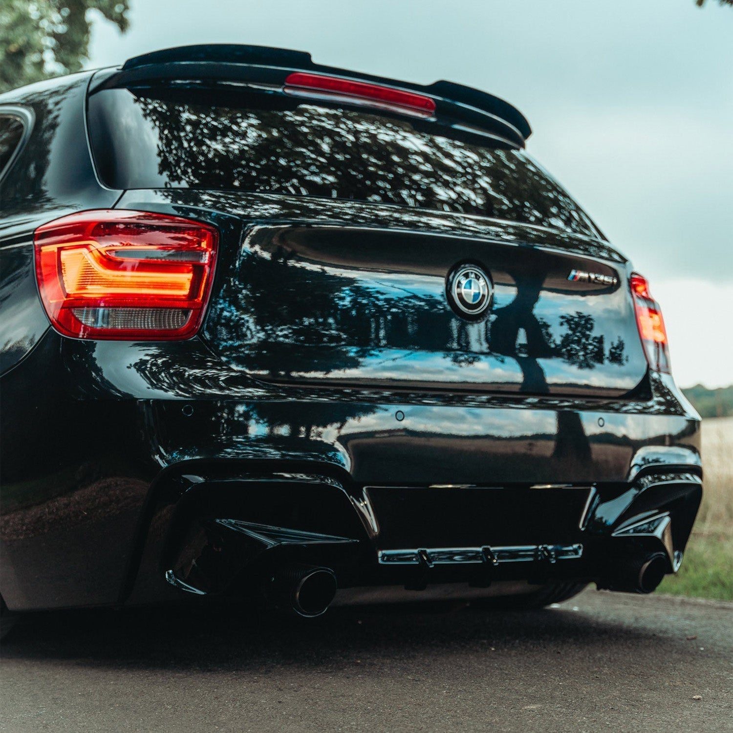 ZAERO Design BMW M135i Pre-LCI Rear Diffuser In Gloss Black Fitted