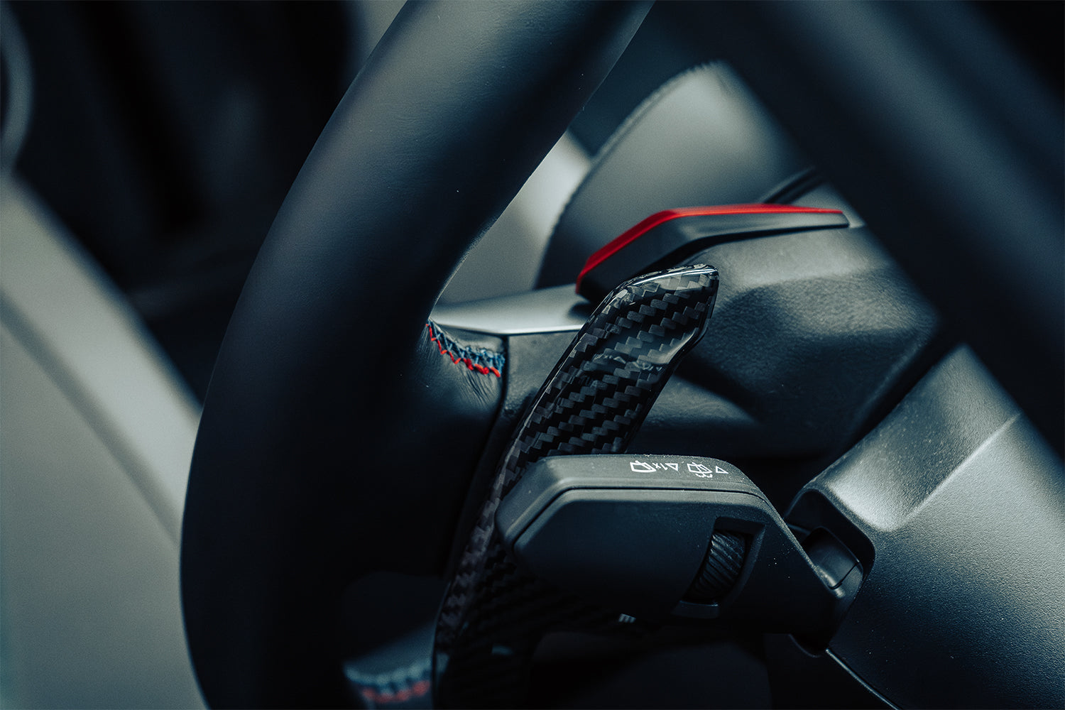 JQ Werks Madtrace Magnetic Paddle Shifters BMW G90 M5 interior close-up