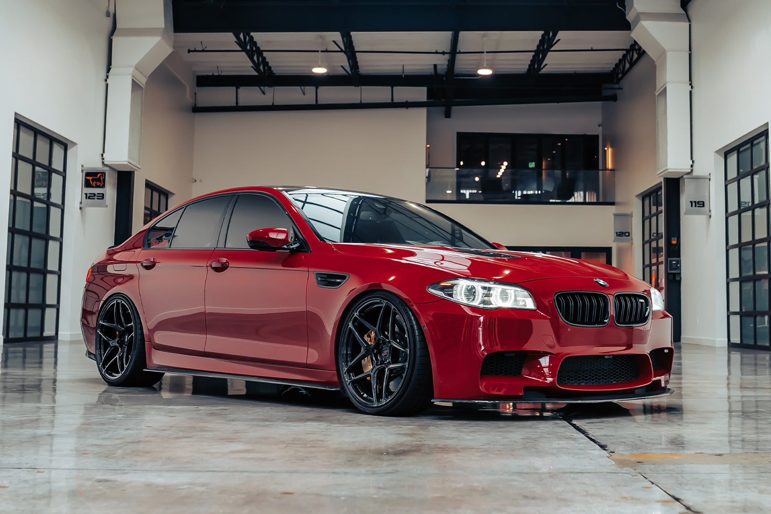 Modified BMW F10 M5 in Imola Red