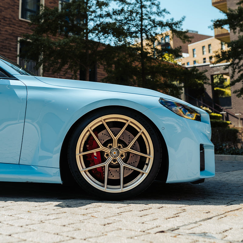 Modified BMW G87 M2 In Zandvoort Blue With Gold Wheels
