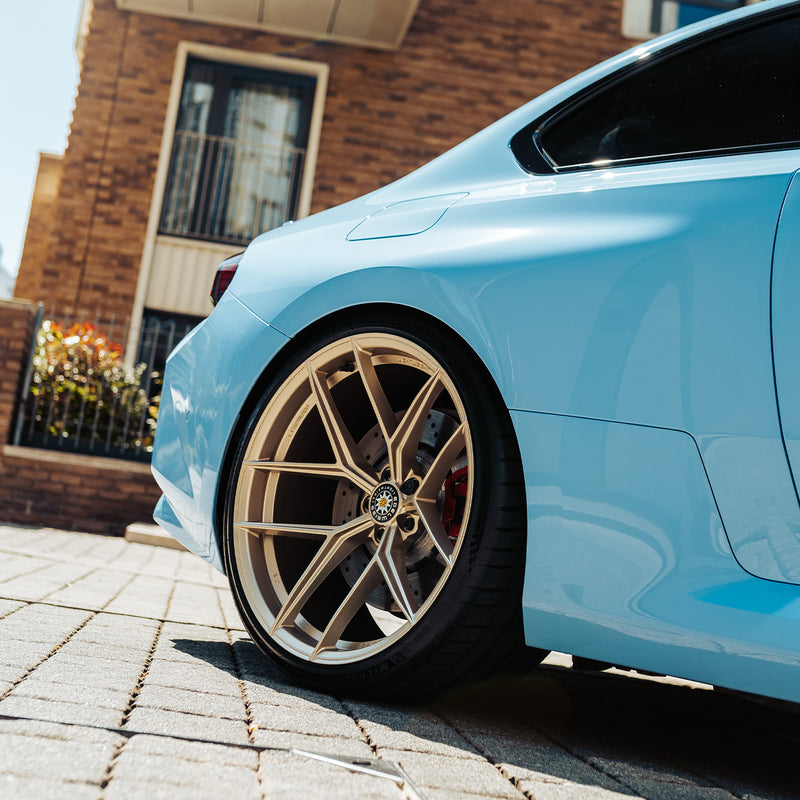 Modified BMW G87 M2 In Zandvoort Blue With Gold Wheels