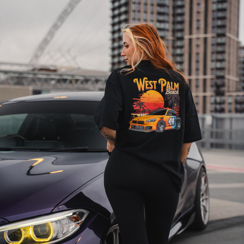 R44 Performance West Palm Beach Tee In Black Worn By Model