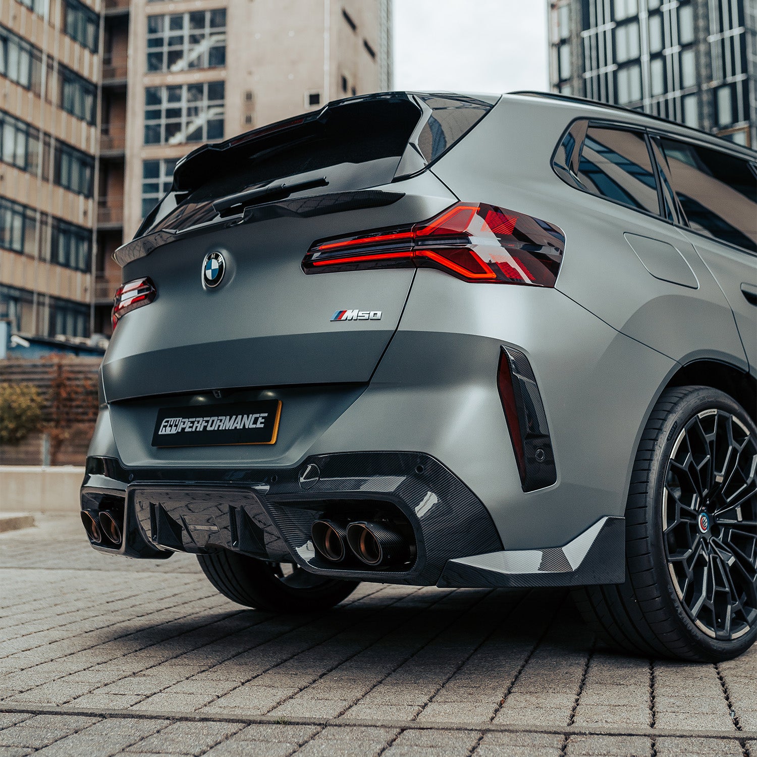 SooQoo BMW G45 X3 Rear Diffuser In Gloss Carbon Fibre