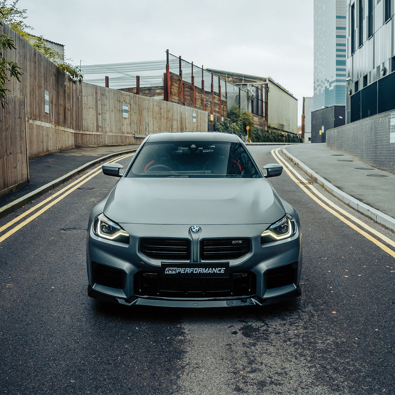 ZAERO Design BMW G87 M2 EVO-S Gloss Black Front Splitter On Grey Car