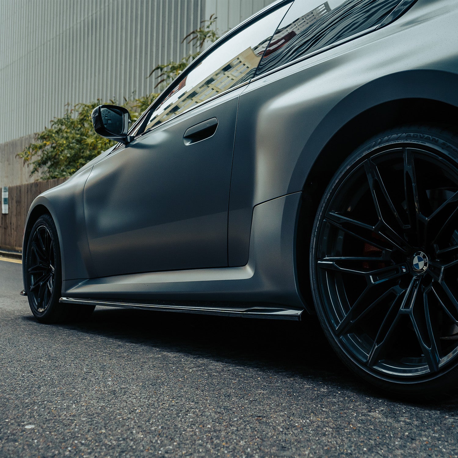ZAERO Design BMW G87 M2 EVO-S Gloss Black Side Skirts Fitted On Grey Car