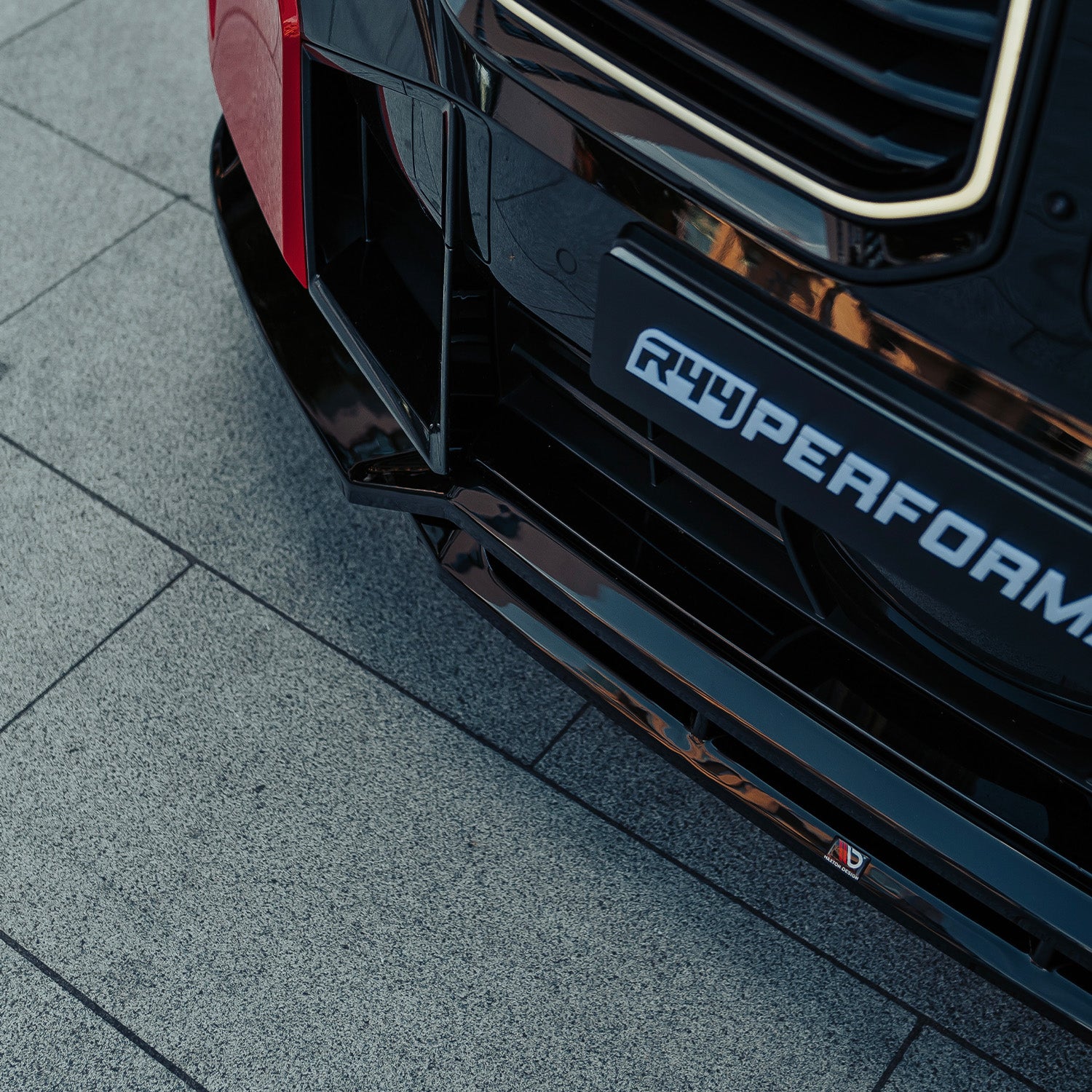 Maxton Design BMW G09 XM V1 Front Splitter In Gloss Black